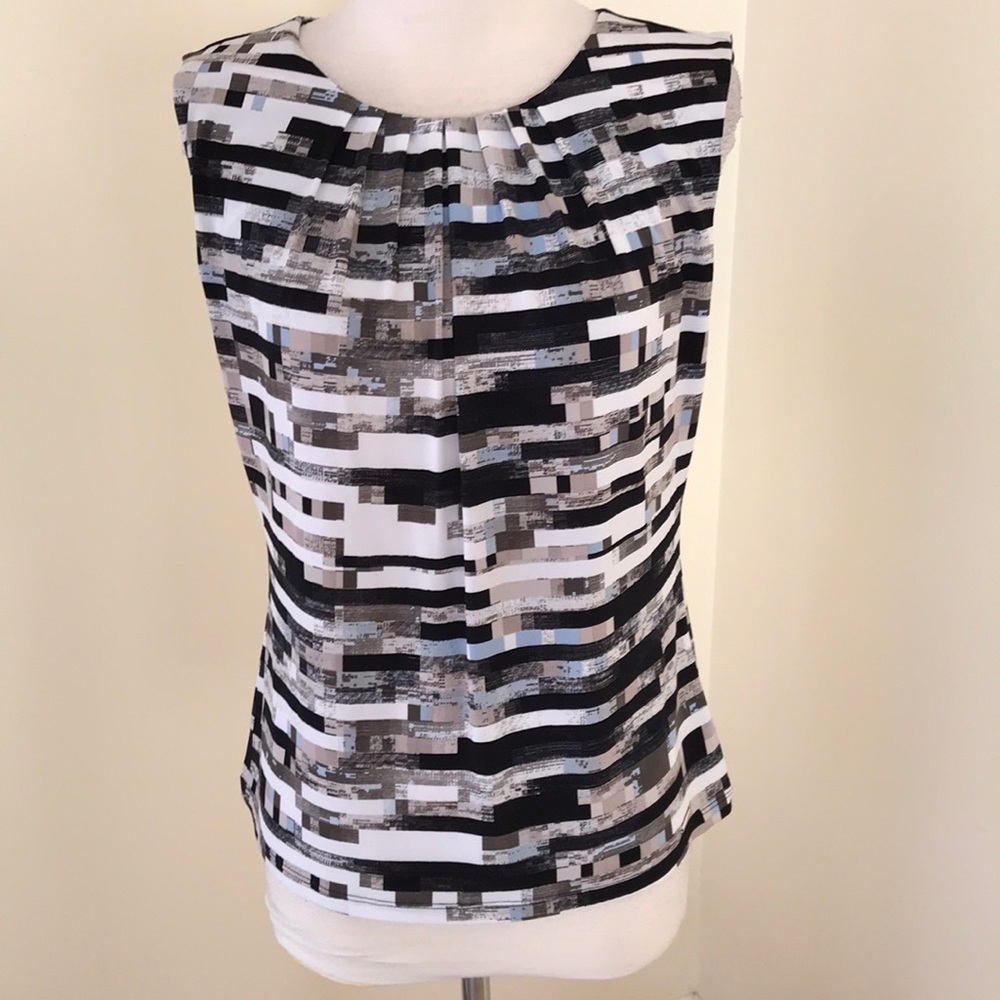 New! Calvin Klein medium white multi sleeveless blouse.